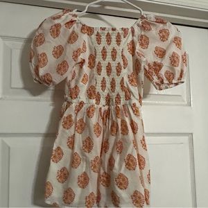 Cream and orange crew cuts romper